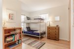 Small children`s library and twin bunks in the front bedroom 